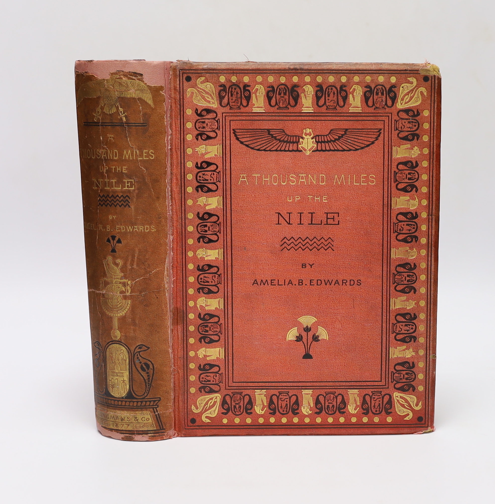 Edwards, Amelia B. A Thousand Miles up the Nile. First Edition. engraved title vignette, 2 folded and coloured maps, 17 wood engraved plates and num. text illus.; publisher's gilt and black pictorial and decorated cloth